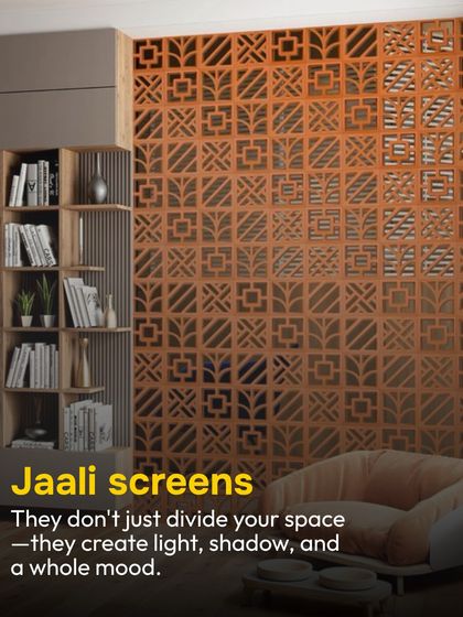 The jaali is more than just a screen; it’s an ancient Indian technique for creating mood and comfort. In this modern living room, a terracotta jaali acts as a partition, playing with light and shadow while allowing for air circulation. It’s a perfect blend of traditional form and contemporary function.