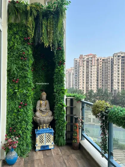 A high-rise balcony is converted into a serene private sanctuary with a custom vertical garden, creating a perfect meditation corner with a view.