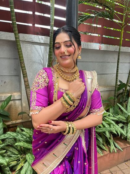 A lovely, happy shot of my client. Her complete look, from the hairstyle to the saree, came together beautifully for a traditional Marathi event.