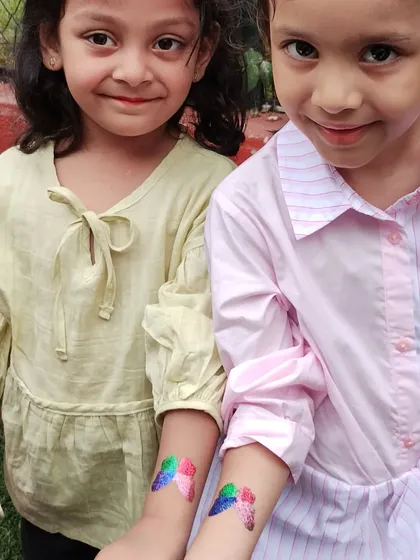 Best friends with matching butterfly tattoos. It’s always fun to create coordinated designs for friends to share at a birthday party.