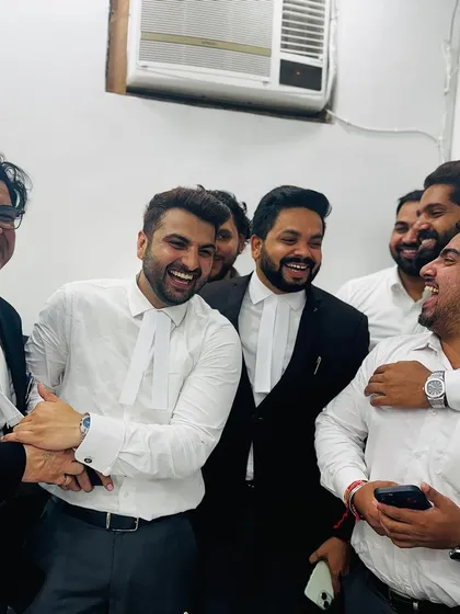 Sharing a laugh with my colleagues. A strong, positive team environment is essential for handling the pressures of our profession.