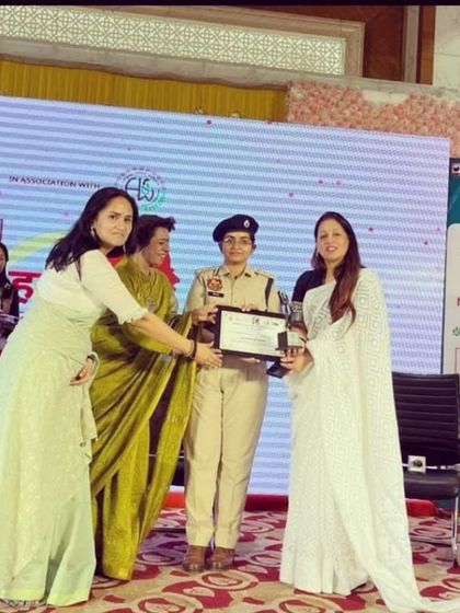 Receiving a certificate of appreciation at the "Hum Mahilaye" panel discussion. It is an honor to be recognized for my efforts in women empowerment.