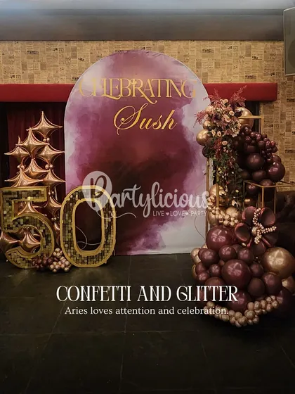 Celebrating a 50th birthday in style. This setup shows our expertise in creating elegant and glamorous decor for adult celebrations. The rich burgundy and gold palette, combined with a custom backdrop and sparkling number display, creates a sophisticated and celebratory atmosphere.