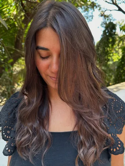 A beautiful transformation for a bride-to-be. We corrected her uneven base color and added soft, romantic highlights to get her ready for her big day.