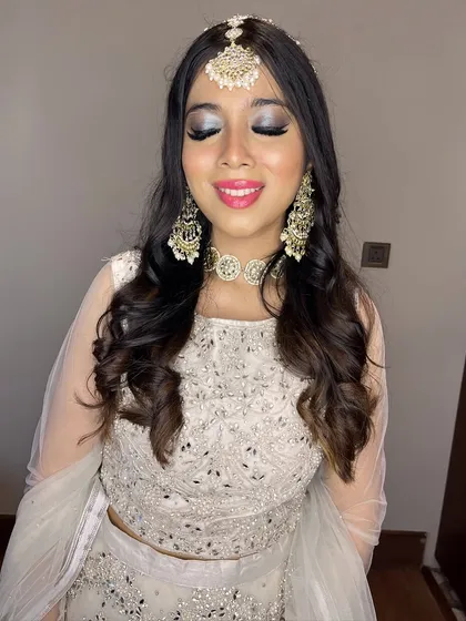 Another look at the stunning silver eye makeup, which catches the light beautifully.