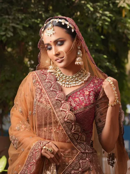 This shot shows the full bridal attire, including the double dupatta draping, which we also cover.