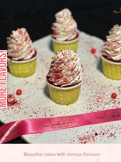 Our Red Velvet cupcakes are a perfect single-serving treat. Topped with a generous swirl of cream cheese frosting and a sprinkle of red velvet crumbs, they offer our signature flavor in a beautiful package.