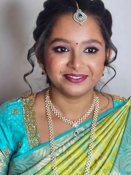 Jebha's engagement glam! A beautiful look with a light blue and green saree, paired with diamond jewelry.