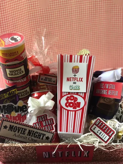 Getting into the Valentine's Day spirit with this fun Netflix & Chill hamper. It's packed with popcorn, snacks, and movie-themed goodies for a perfect night in.