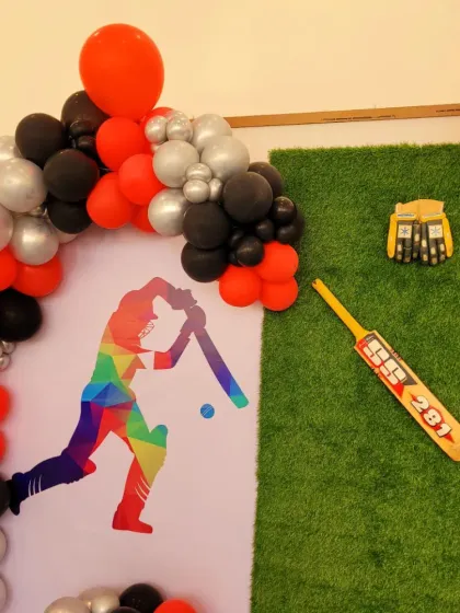 For the little cricket enthusiast, this cricket-themed party is a big hit. The backdrop is an artificial grass wall decorated with bats, wickets, and a custom scoreboard for the birthday boy's "8th Innings."