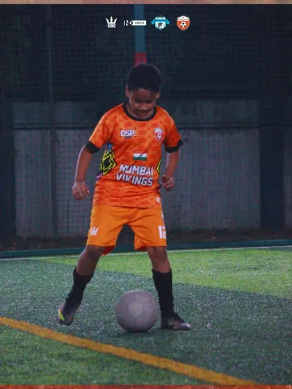 Even the smallest steps are important. A young player focused on his first touches.