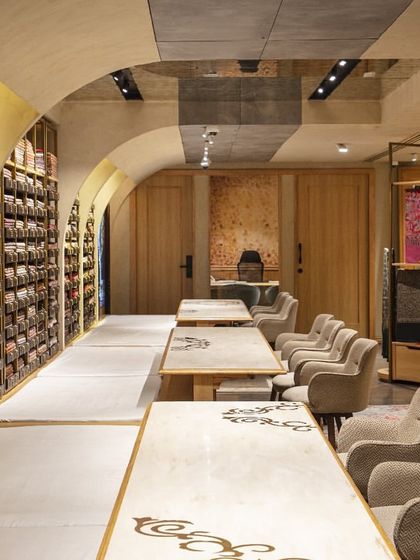 The consultation tables at Ahujasons are set within arched nooks, creating a sense of privacy and focus. The design allows for unhurried, personal interactions, transforming the act of shopping into a curated and memorable experience.