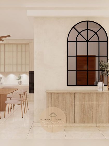 A custom light wood console sits below an arched window-pane mirror in this foyer. This piece provides storage while setting a warm and welcoming tone from the moment you enter the home.