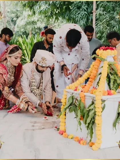 The couple offering prayers together, a sacred start to their married life.