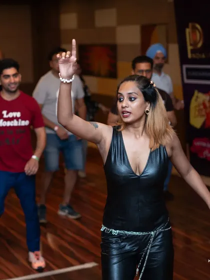 Leading the class with clear instructions. My goal is to empower you with the skills and confidence to express yourself freely on the dance floor.
