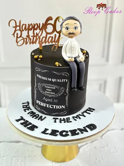 Celebrating a true legend on his 60th birthday. This Jack Daniel's inspired cake is customized for 'Dad' and calls him 'The Man, The Myth, The Legend'.