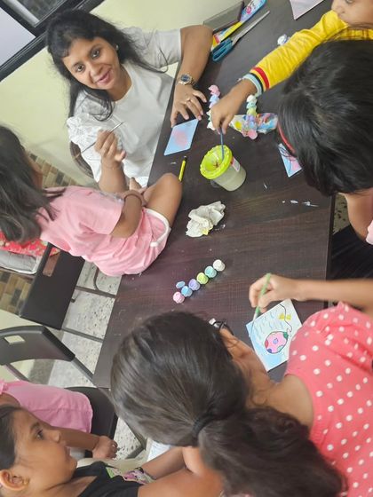 Here I am, right in the middle of the creative chaos during our Children's Day celebration. It's moments like these that I cherish the most.
