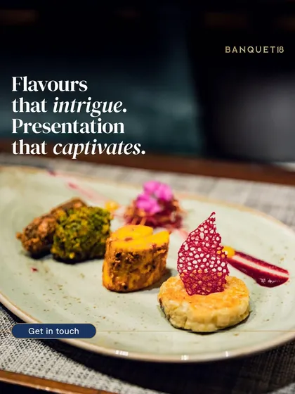 Plating is an art. This dish, featuring a paprika corn patty, garlic-crusted steamed banana, and chimichurri cottage cheese, was part of a special menu we designed in collaboration with Taj. It shows our commitment to creating food that is as beautiful as it is delicious.
