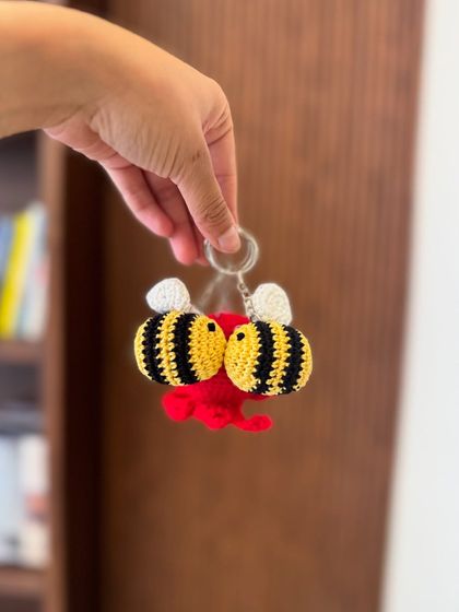 A close-up of our adorable bumblebee and octopus keychains. The detail on these little guys is amazing.