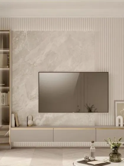 A sleek and contemporary TV unit with a soft, neutral color palette. The combination of a textured back panel and a glass-enclosed display cabinet adds both style and function.