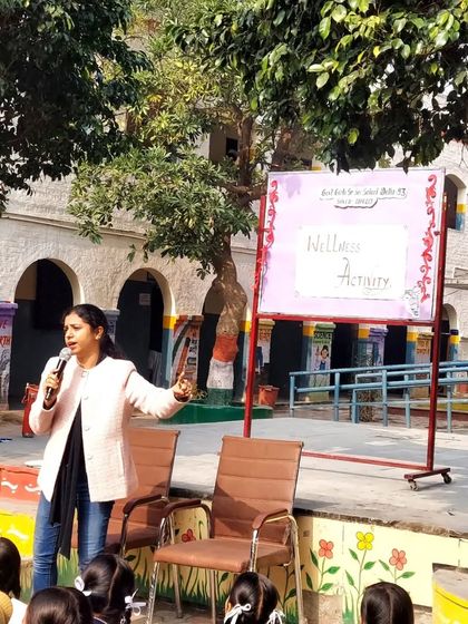 A wellness activity in progress at a government school. Practical, hands-on sessions are far more effective than just lectures, especially for younger audiences.