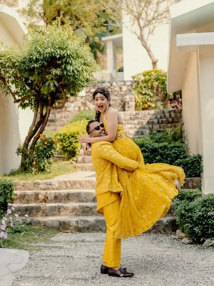 Pure, unadulterated joy. I encouraged them to be playful, and this moment of him lifting her up is the wonderful result. My goal is to make you feel comfortable enough to laugh and be yourselves, resulting in candid pre-wedding photos that are full of life and energy.