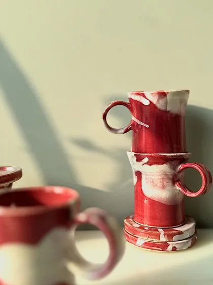 A playful stack of cups from the Flamingo series, showing how they can be displayed as functional art.