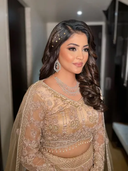 A final look at Krisha's glamorous sangeet makeup, capturing her radiant glow.