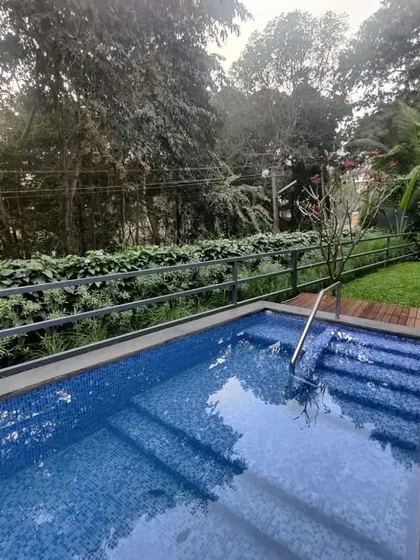 This is how we create natural privacy. For this private villa in Goa, we designed a beautiful green wall that screens the pool area from view. It's a simple, elegant, and living solution that is far more beautiful than a traditional fence.