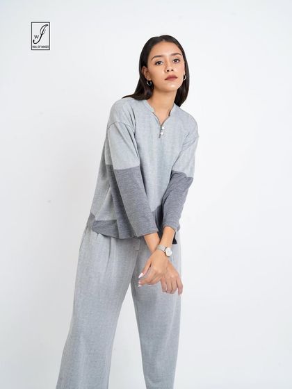 Another view of the lounge set, highlighting the texture and details of the fabric.