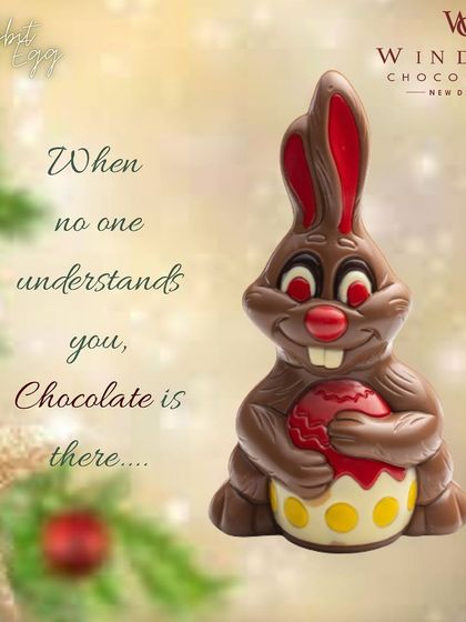 My Easter Bunny chocolate figure, holding a decorated egg. This piece uses milk, white, and colored chocolate for a festive look.