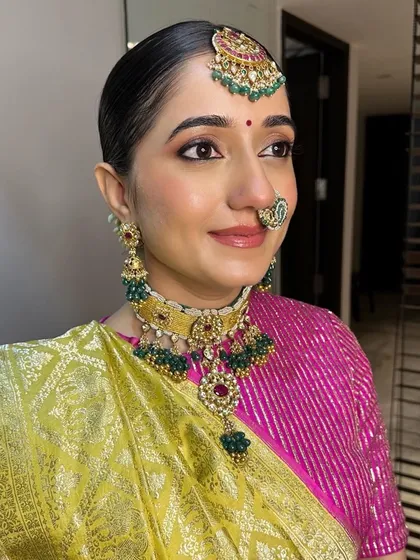 Another beautiful close-up of Archi. The makeup is perfectly balanced to feel both traditional for the ceremony and fresh for a modern bride.