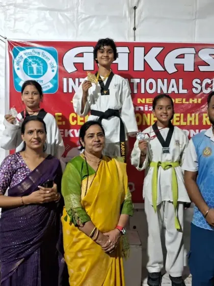 Our female champions on the podium at the CBSE Central Zone Taekwondo Championship. We have a strong track record of success in school-level competitions.