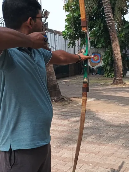 This archer is in the middle of his shot sequence, a process we break down step-by-step during our coaching sessions.