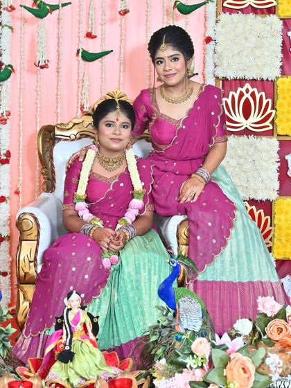 Nothing makes me happier than dressing sisters for their special moments. I designed these matching turquoise and purple Langa Voni outfits for a half saree function, ensuring they both looked coordinated yet unique.