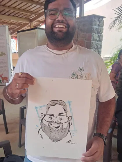 This guest's happy expression is perfectly captured in his caricature.
