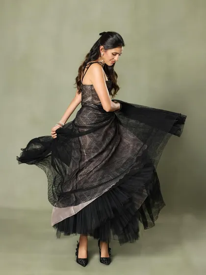 A playful twirl in the Giambattista Valli gown, showing the beautiful movement of the tulle skirt.