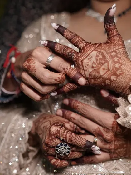 This is the final result I always aim for. The deep, rich mehendi stain looks absolutely stunning against the bride's sparkling outfit and jewelry, completing her wedding look.