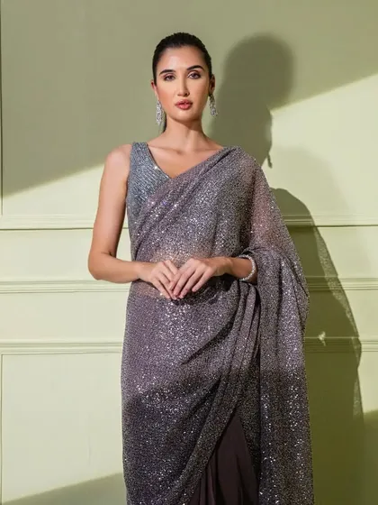 A portrait shot of the grey ombre sequin saree, capturing the beautiful shimmer and the sophisticated color gradient.