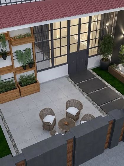 An aerial view of the complete verandah design, showing the layout with its distinct seating and relaxation zones, surrounded by lush greenery.