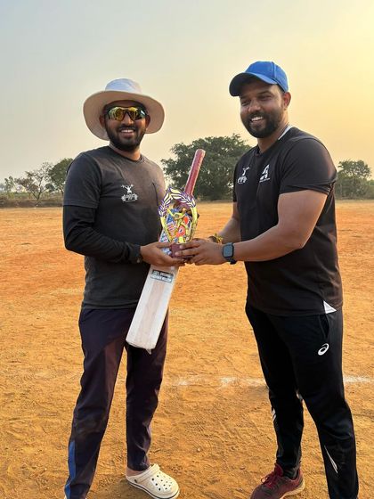 Awarding the trophy for the best batsman of the tournament. We celebrate individual achievements as much as team victories.