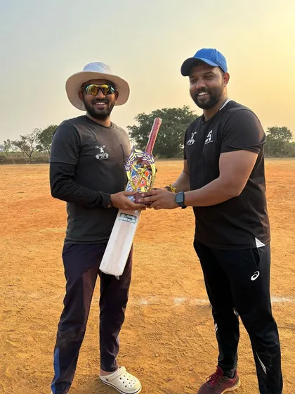 Awarding the trophy for the best batsman of the tournament. We celebrate individual achievements as much as team victories.