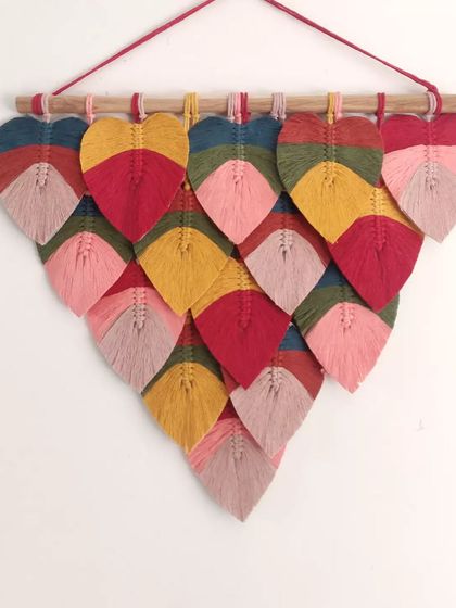 Pop your wall with this bold and vibrant macrame leaf hanging. Accent decor like this can instantly transform a room and change the vibe of your whole house.