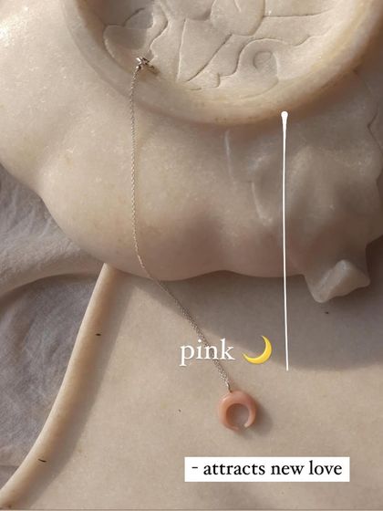 A choice between two powerful moons: the Pink Opal moon to attract new love, and the Peach Moonstone crescent for luck. Both are handmade with specific intentions.