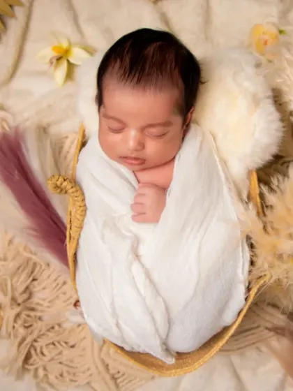 A tiny miracle, swaddled in soft, natural fibers. Our boho-inspired newborn shoots have an earthy and gentle feel.