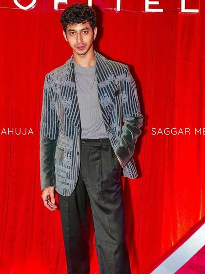 Mihir Ahuja aces the look in our grey velvet coat. Lavishly crafted from plush velvet and adorned with exquisite hand embroidery, it's a statement piece for any occasion.