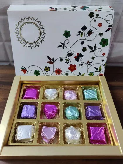 My homemade chocolate gift boxes are perfect for any occasion. I hand-wrap each chocolate and arrange them in these beautiful boxes, ready for gifting.