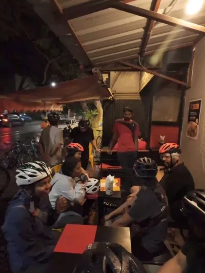 Dinner at a local eatery during our 'Freewheelin'' meetup. We love exploring the city's food scene as much as its cycling routes.