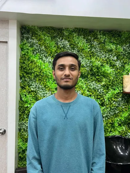 The final result: a happy client with a fresh, modern haircut that suits his style, ready to take on the week.