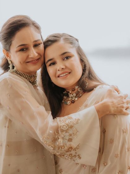 A warm embrace between mother and daughter. For both, I created soft, natural makeup looks that felt comfortable and allowed their happiness to be the focus.